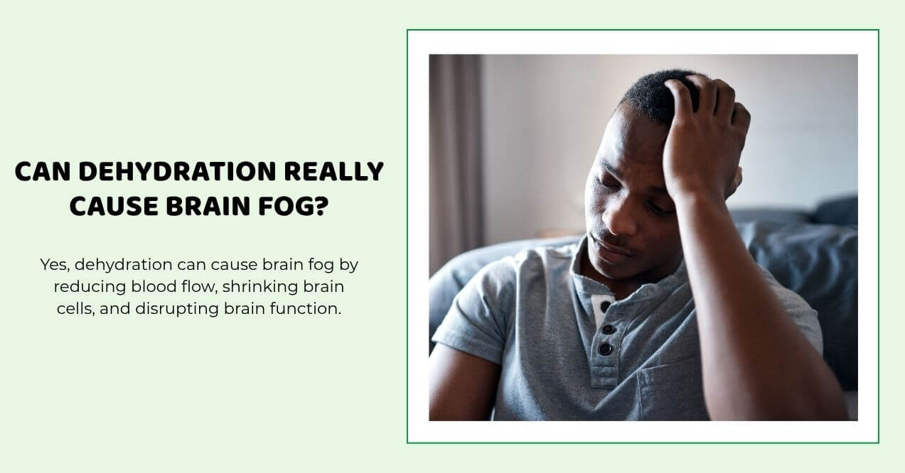 Man with headache sitting, showing signs of dehydration-related brain fog