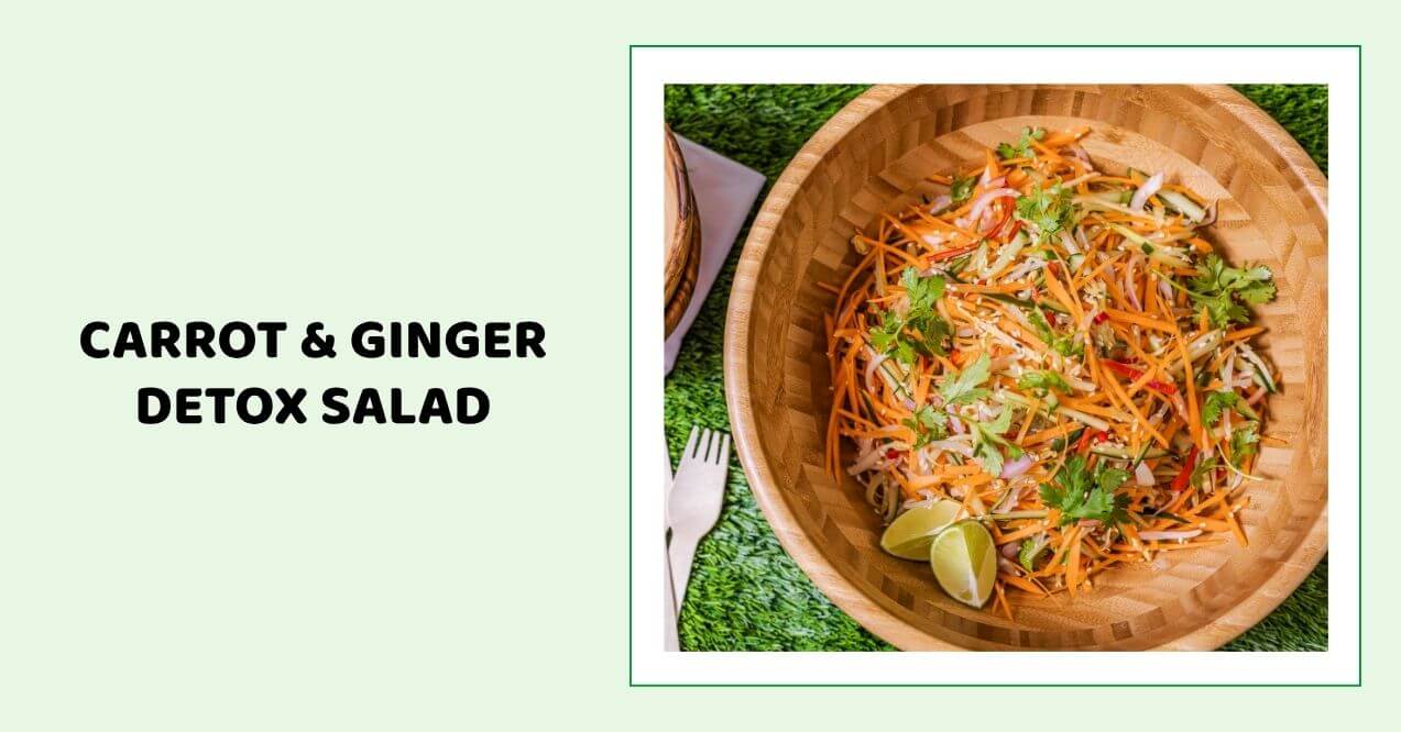 Carrot and ginger detox salad in a wooden bowl with lime garnish.
