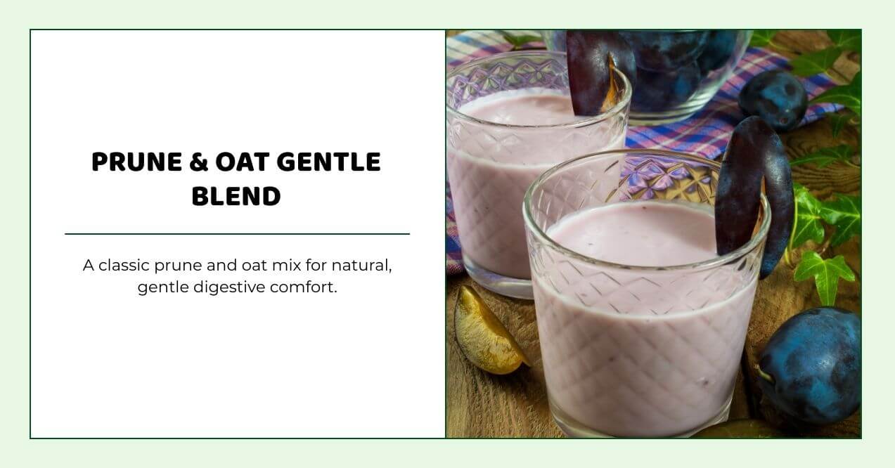 Prune and oat smoothie in glass with fresh plums and rustic background